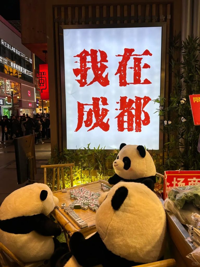 Giant panda dolls playing mahjong in Chengdu’s trendy street scene