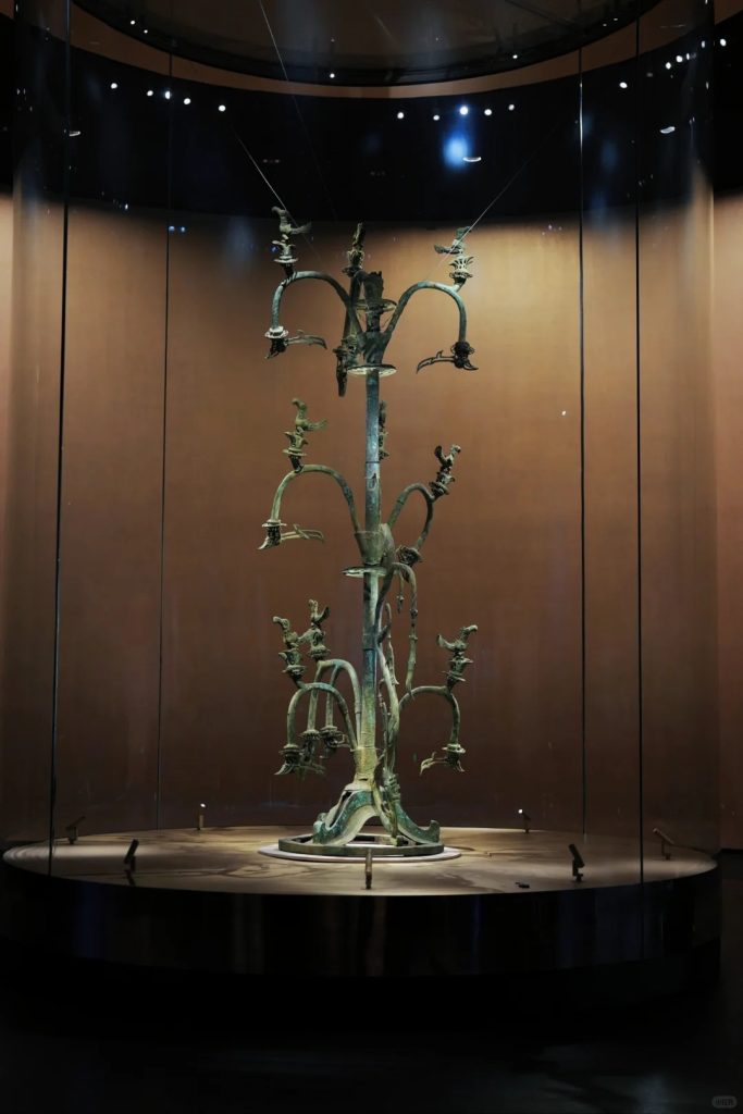 The legendary bronze sacred tree artifact displayed in Sanxingdui Museum