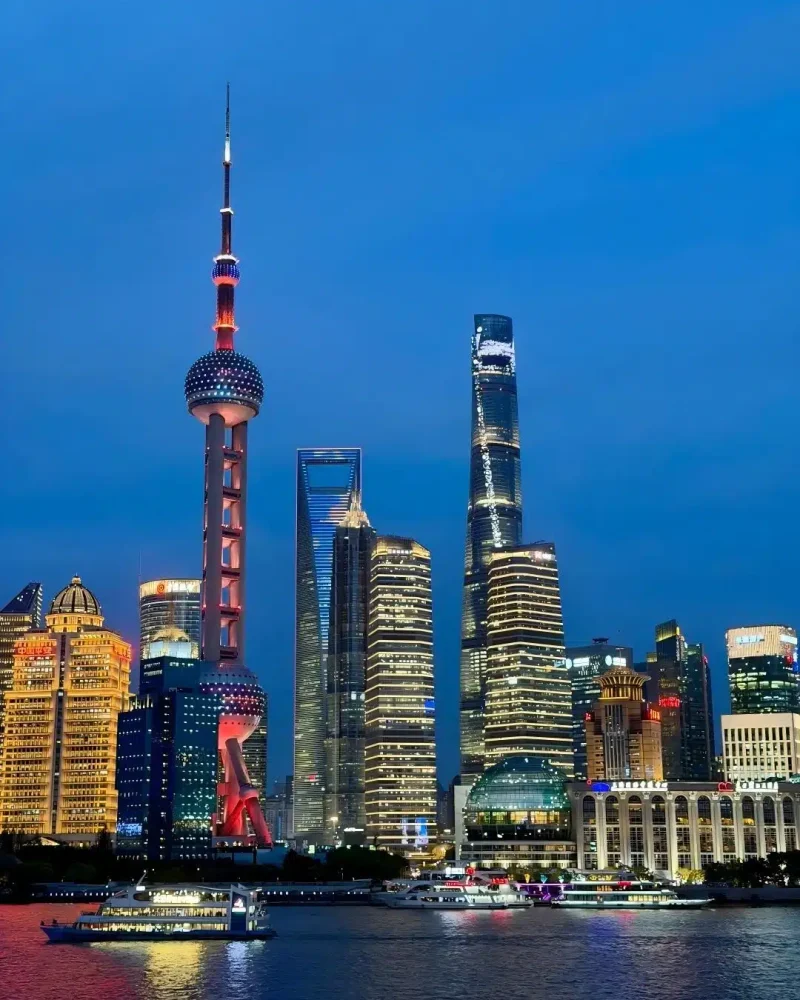 Shanghai’s illuminated Pudong skyline across the Huangpu River