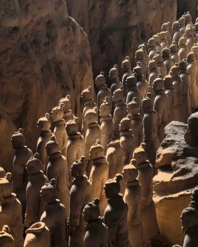 Rows of Terracotta Warriors in an excavation hall near Xi’an