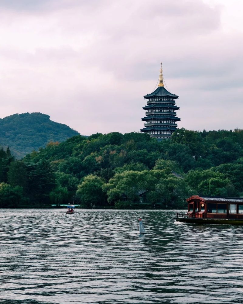 Boat cruising on West Lake in Hangzhou during a 9-day Eastern China tour