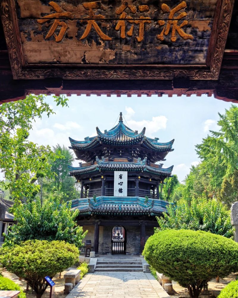 Traditional Chinese architecture at the Great Mosque of Xi'an with trees.