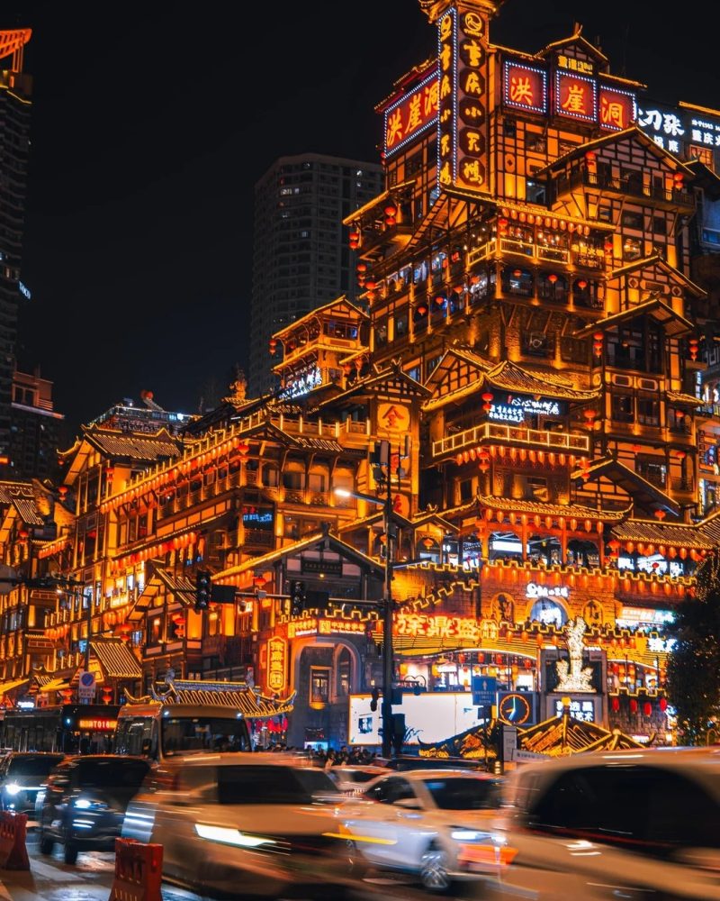 Hongyadong night view in Chongqing with illuminated riverside buildings