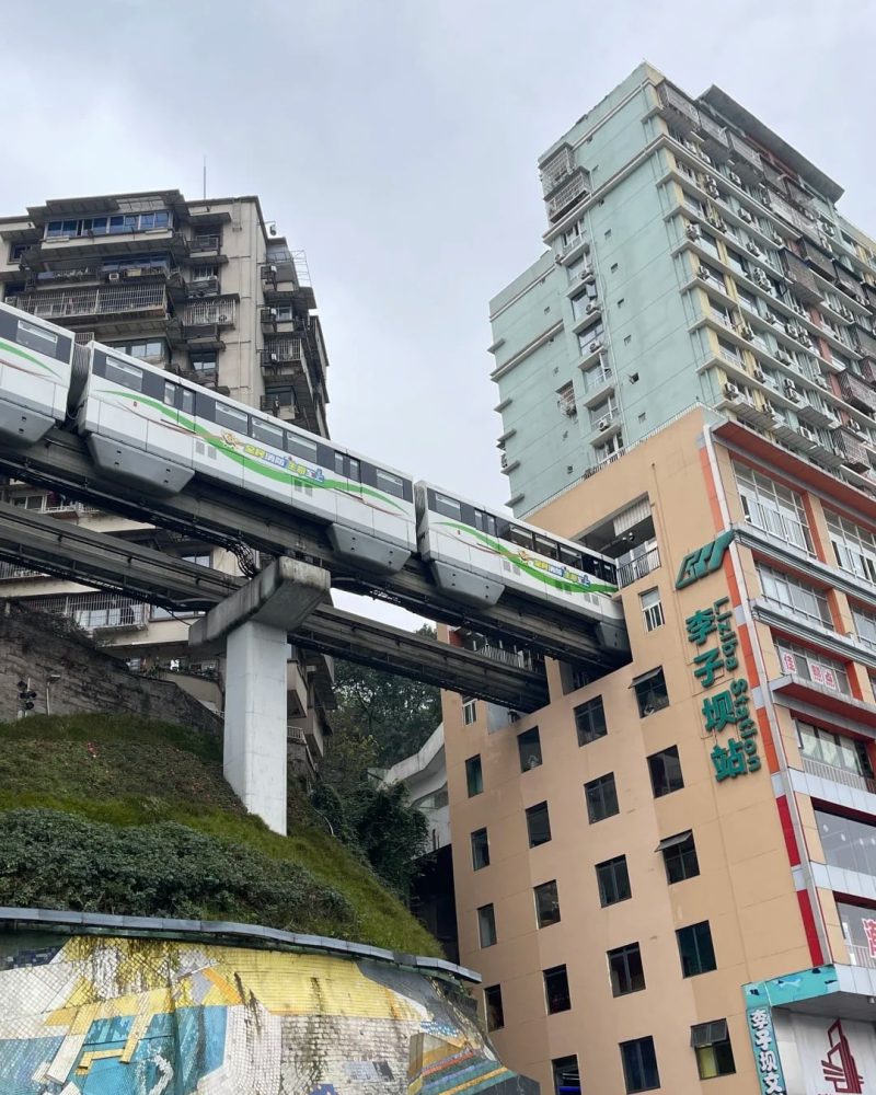 The Liziba Monorail passing through a residential building in Chongqing
