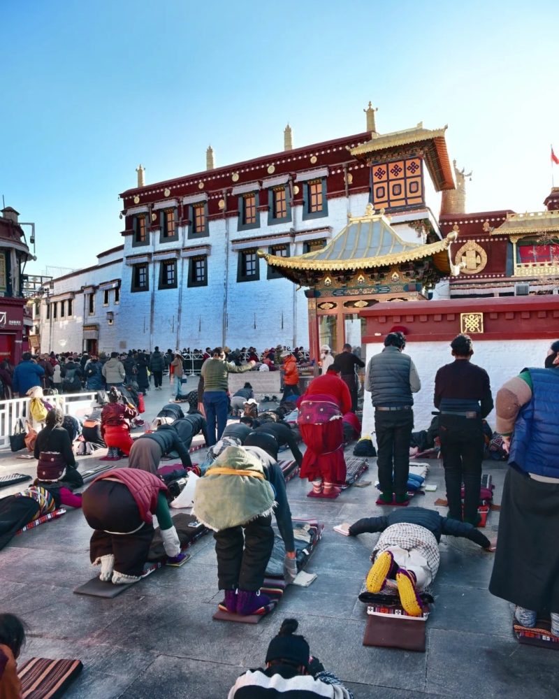Pilgrims outside Jokhang Temple in Lhasa, Tibet