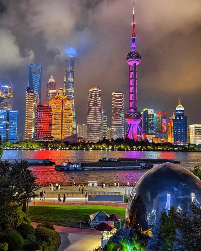 Night view of Shanghai skyline across the Huangpu River, including Lujiazui and the Oriental Pearl Tower
