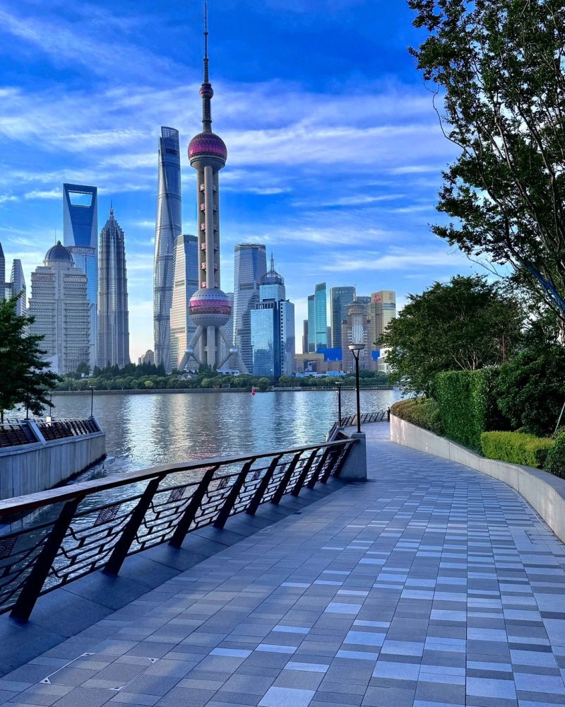 North Bund riverwalk in Shanghai at dusk with Pudong skyline views