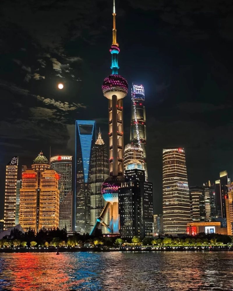 Shanghai skyline at night with the Oriental Pearl Tower and skyscrapers