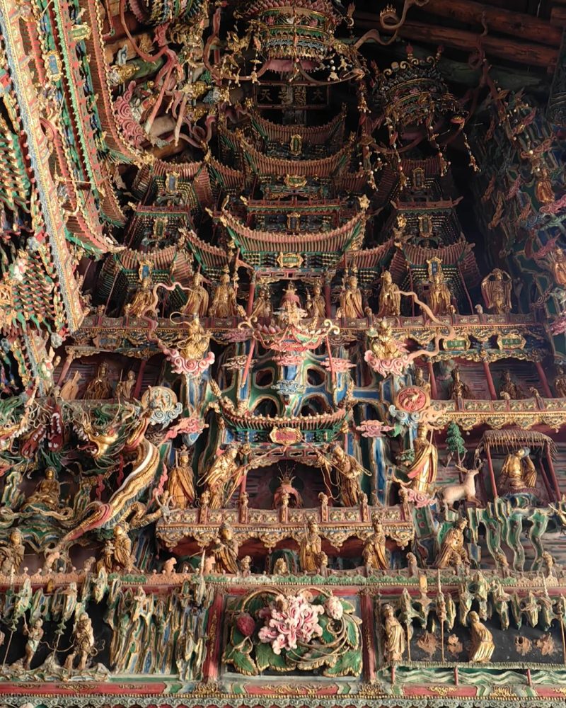 Suspended Buddhist sculptures inside Xiaoxitian in Shanxi
