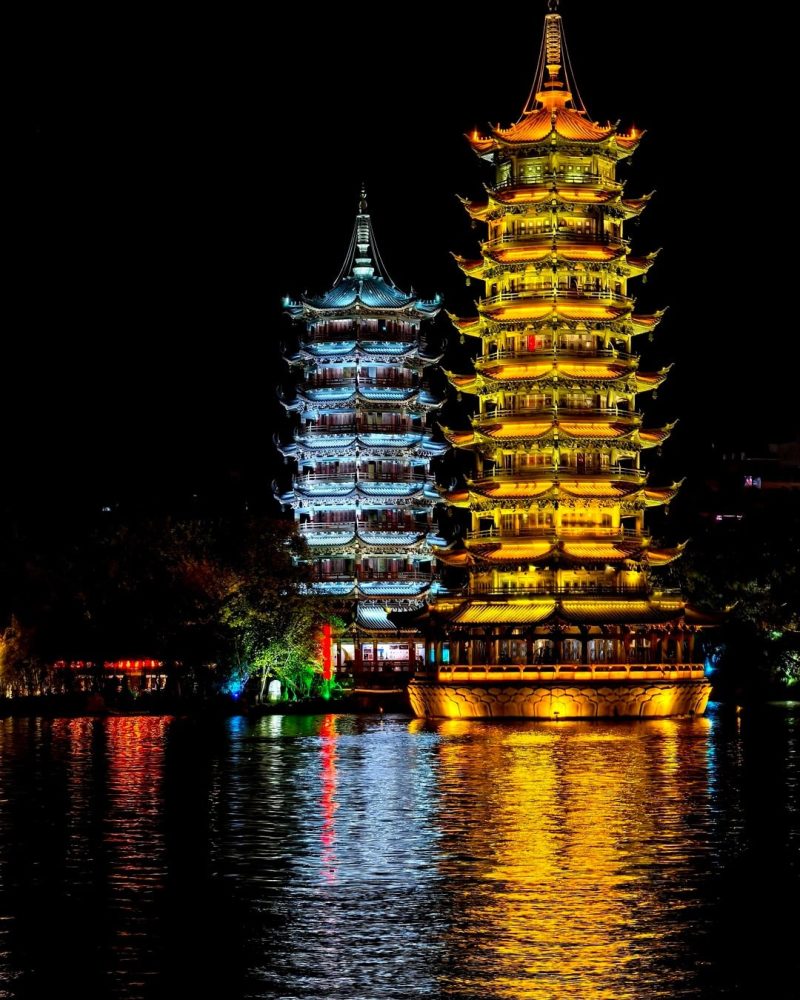 Sun and Moon Pagodas reflected at night in Guilin