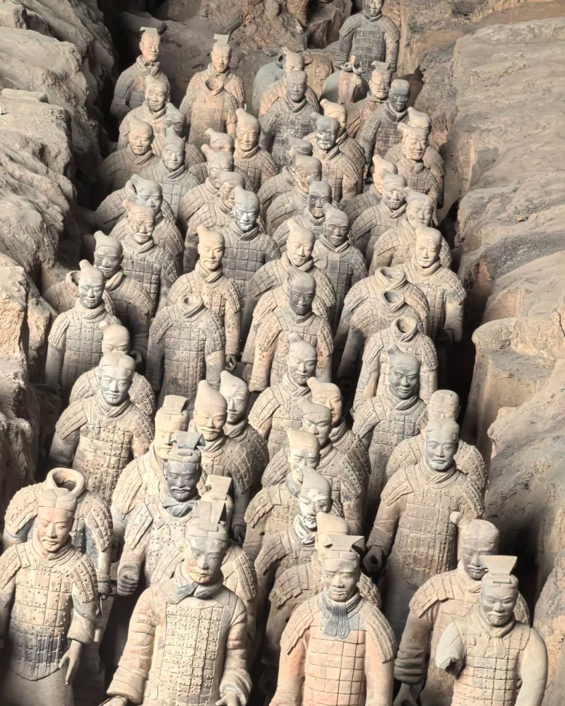 Terracotta Warriors in Xi’an, China, standing in excavation pits of the ancient Qin army