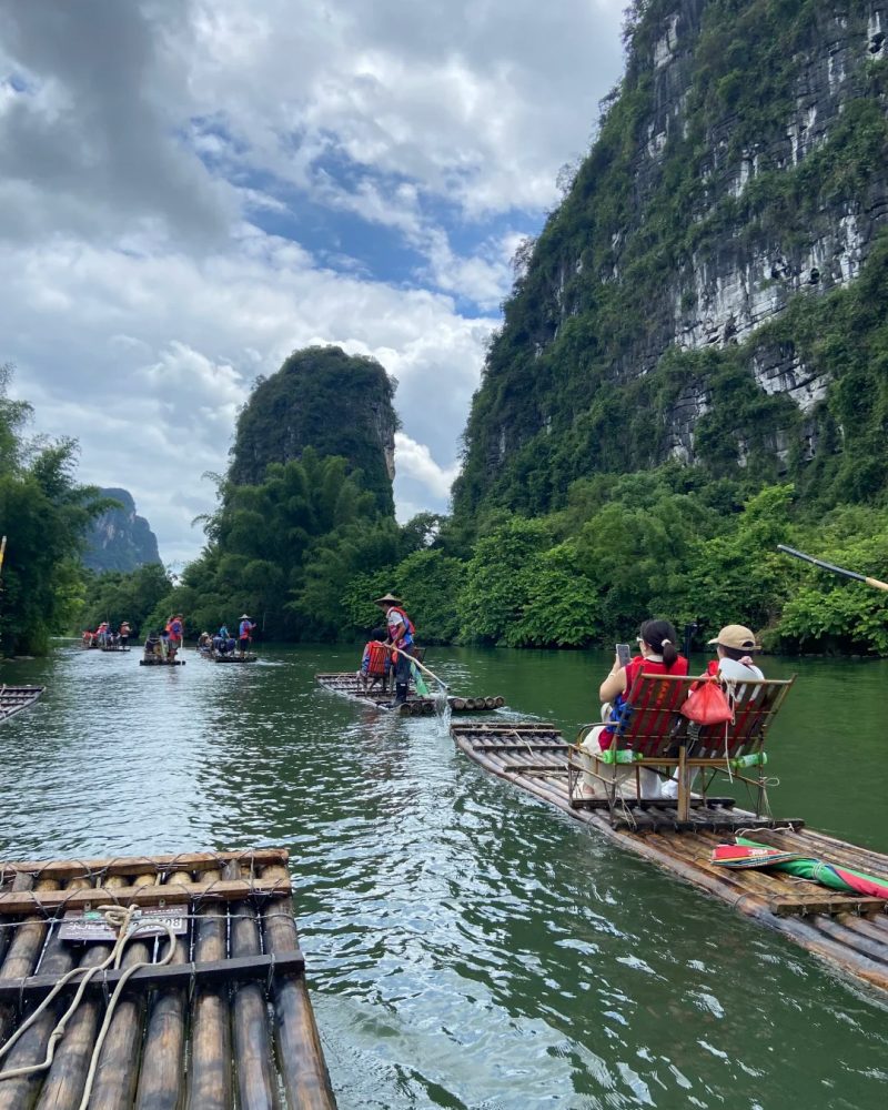 Yulong River bamboo rafting in Yangshuo with karst mountain scenery