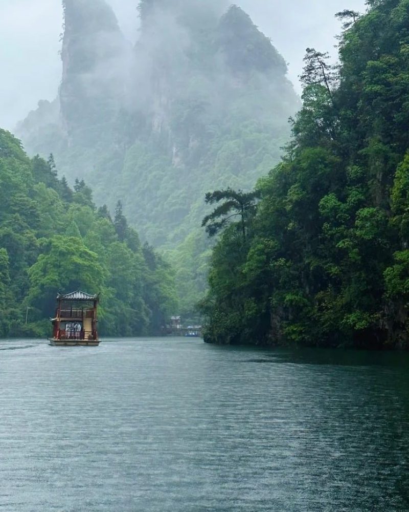 Baofeng Lake mountain scenery in Zhangjiajie with a traditional boat
